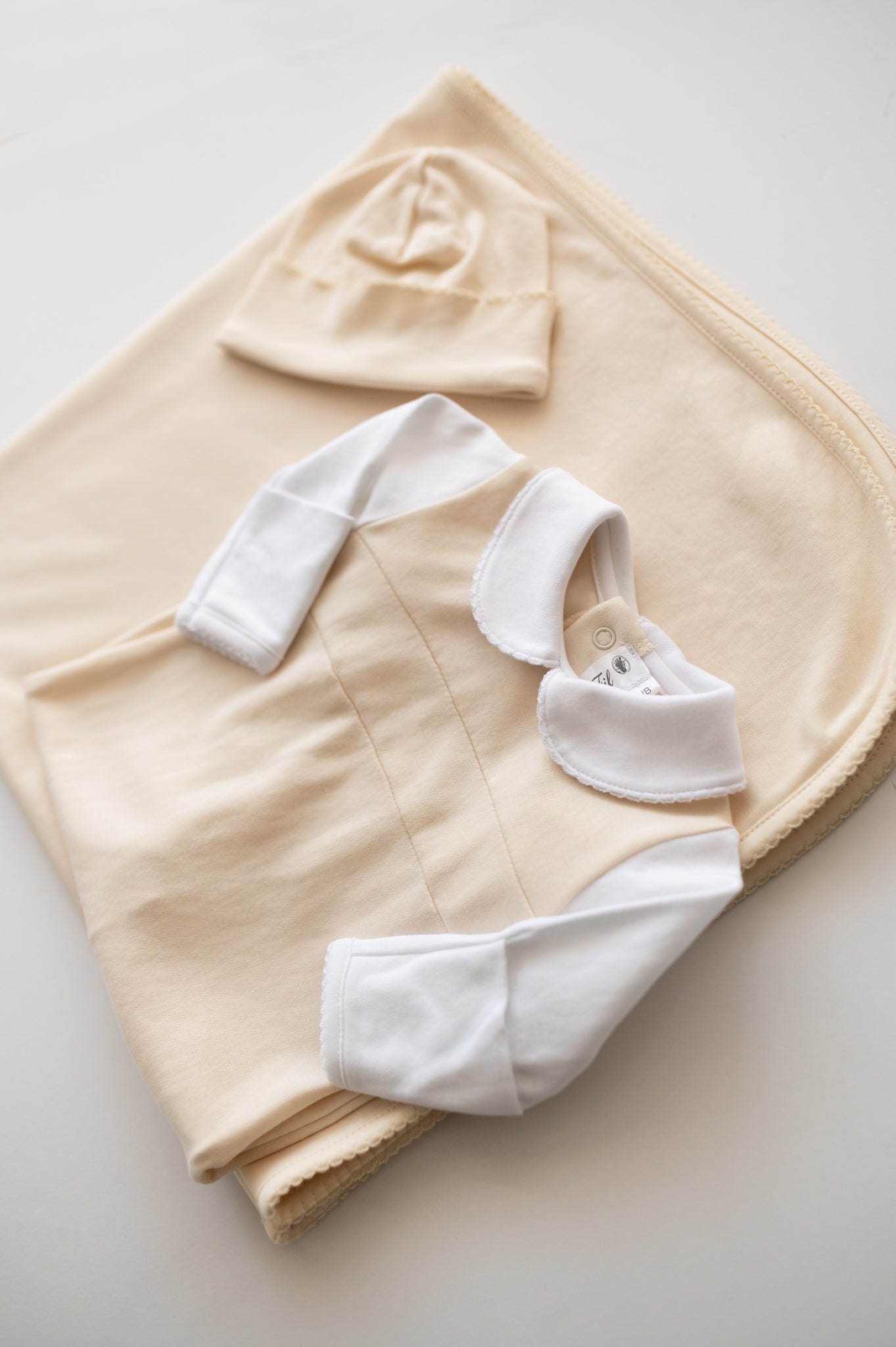 Newborn hospital coming home outfit with soft footie, hat and blanket